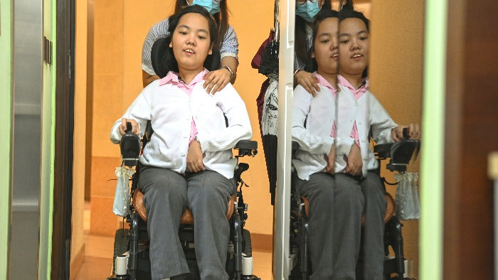 Young Girl with Spinal Muscular Atrophy Chasing Dreams - Kwan Yi Lai